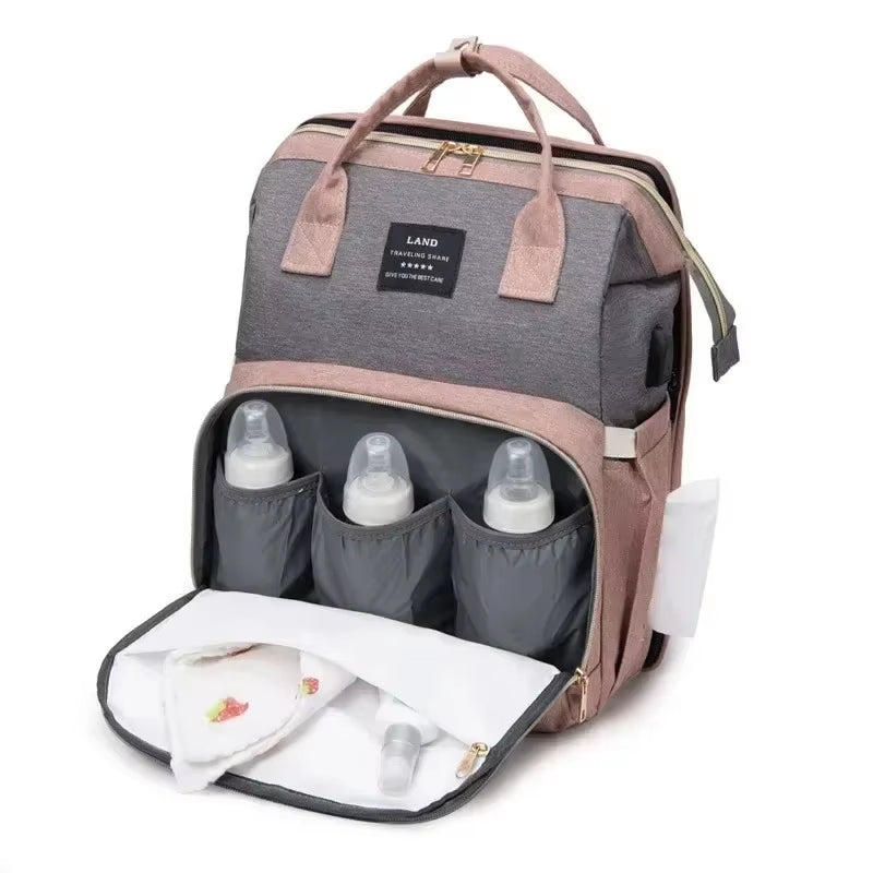 Ultimate Folding Mommy Bag: Portable Crib Bed & Stylish Diaper Backpack for Active Moms